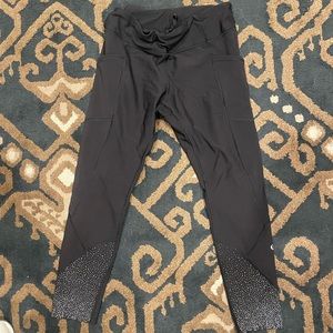 Lululemon leggings, Size 8, Black with detailing on calves